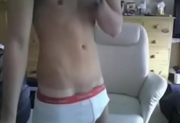 Cute amateur twink shows his heavy dick on webcam