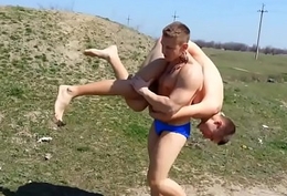bodybuilders bandeau in public and grapple with